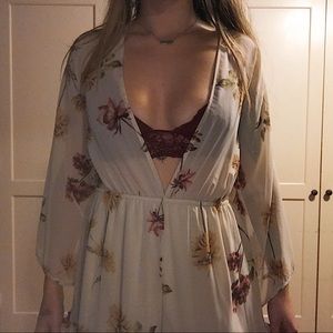 bell sleeve with ruffle floral romper